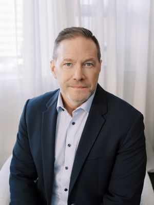 Portrait of Cam Sterns, REALTOR®.
